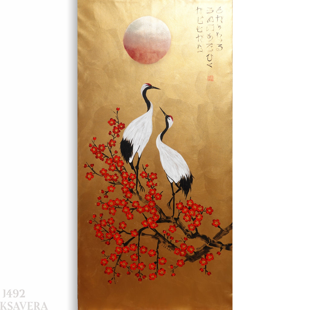 two white cranes standing on a branch with red flowers, against a golden background with a large red sun in the sky.