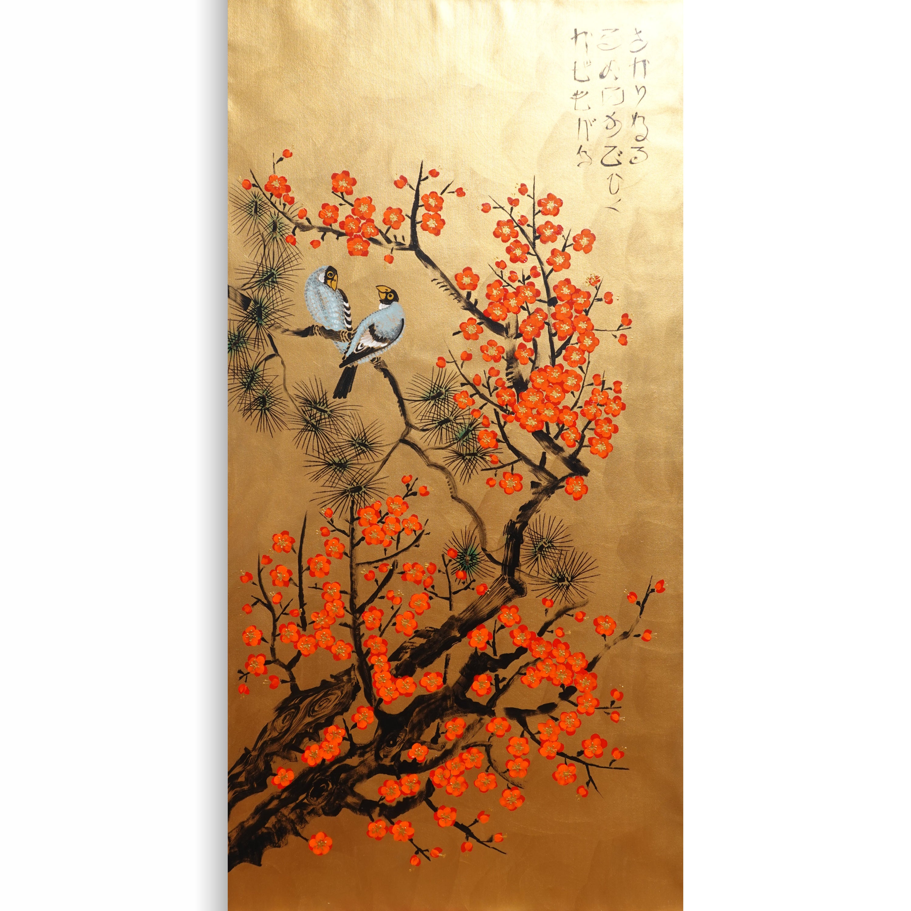 two birds perched on a branch adorned with vibrant orange flowers.