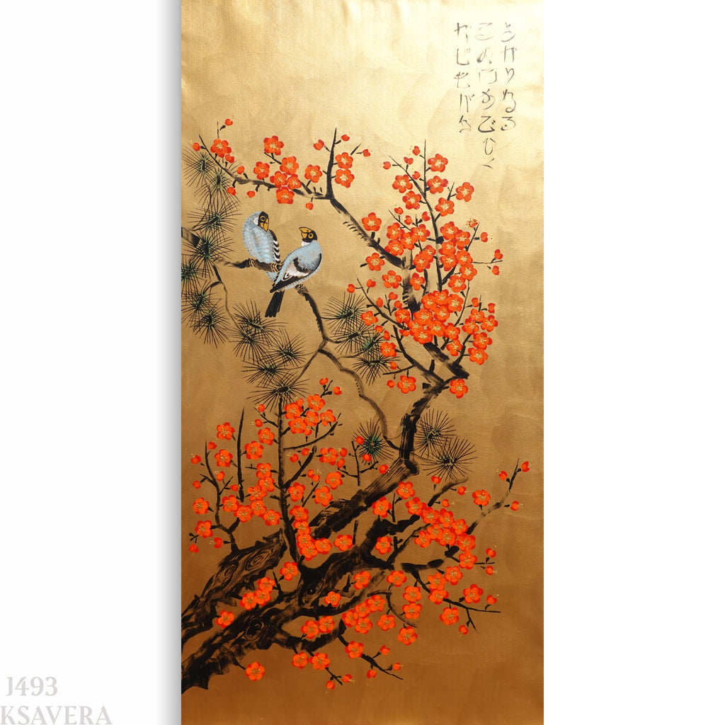 two birds perched on a branch adorned with vibrant orange flowers.