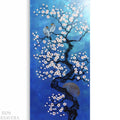 A painting depicting a tree with white flowers and two birds perched on its branches, set against a blue background with a large moon visible in the right corner.